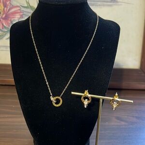 Gold plated stainless steel interlocking roman numeral necklace and earr…